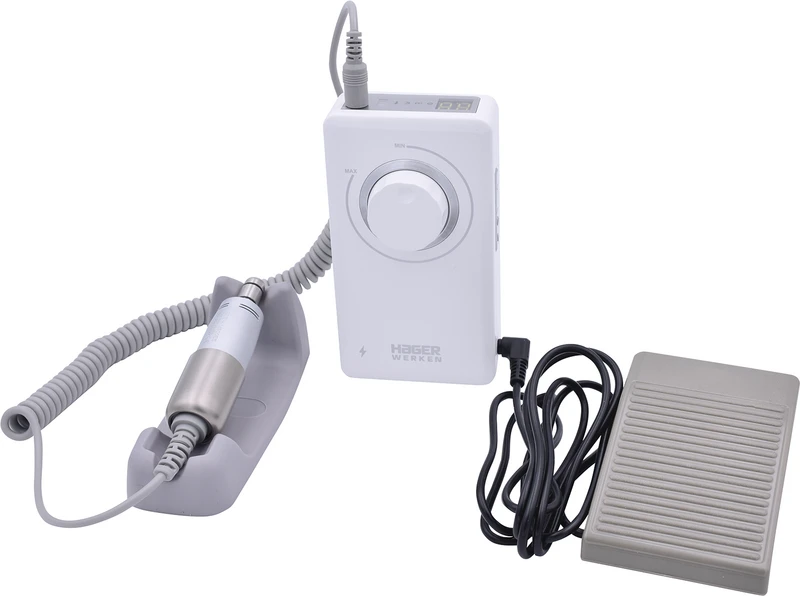 Stück inklusive Ladegerät, Handstück-Ablage, Fußschalter, Steuerbox mit Clip Stück inklusive Ladegerät, Handstück-Ablage, Fußschalter, Steuerbox mit Clip